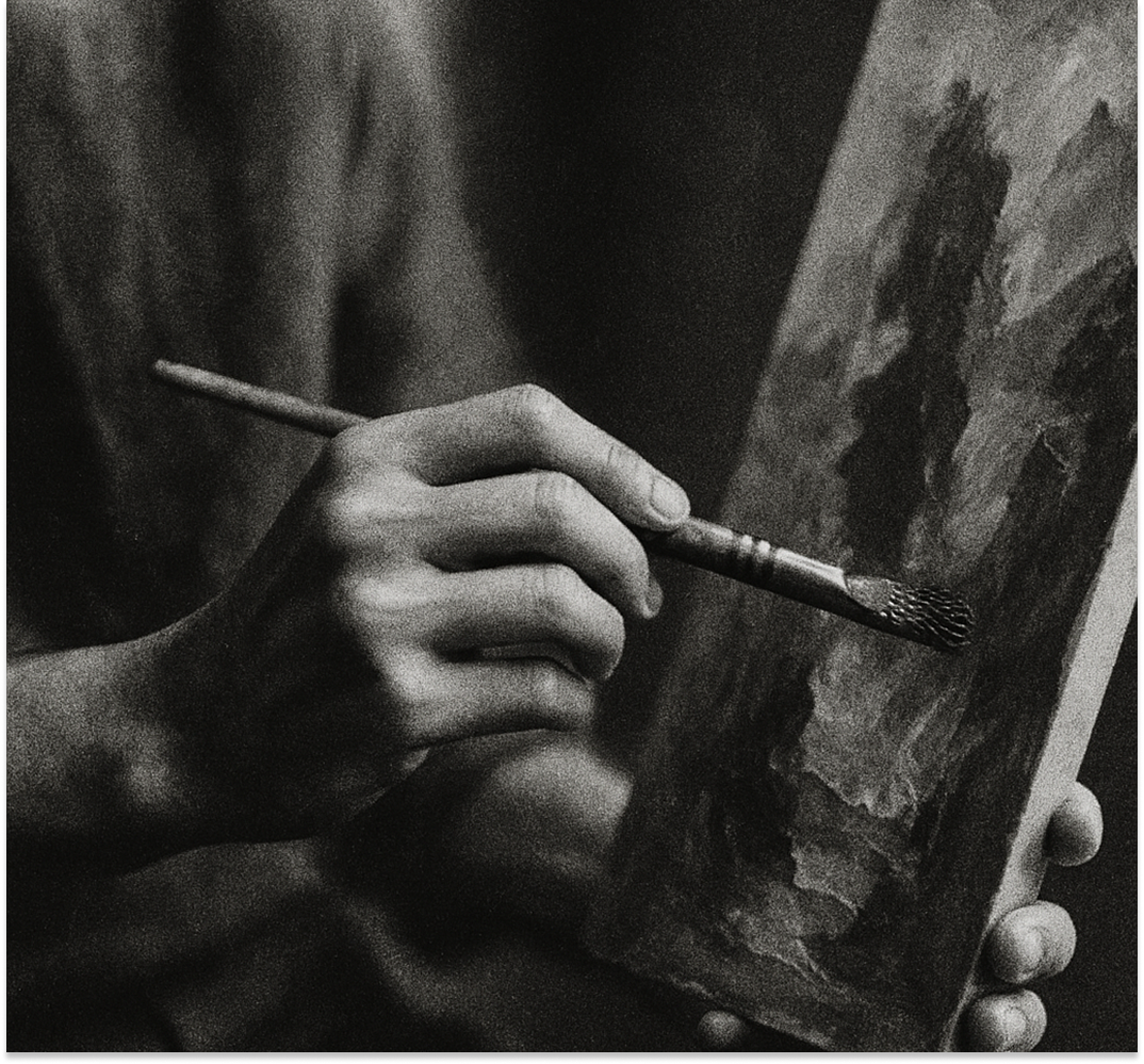 a black and white, artistic, and grainy image of a person oil painting. Should be an up close image, so that only their hands are in focus or their body is at least partially obscured.